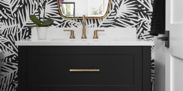 black-and-white-bathroom-bold-wallpaper-brushed-gold-accent-black-cabinet-guest-bath