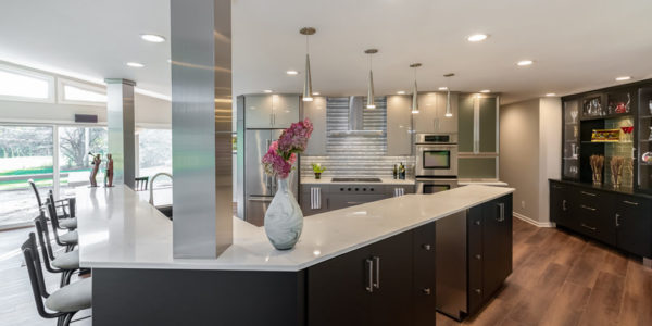 black-cabinets-stainless-steel-L-shape-island-kitchen