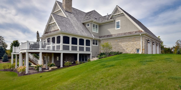 exterior-elevation-white-gray-home-shingle-roof-two-level-porch