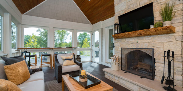 screened-porch-vaulted-ceilings-interior-shingles-stone-fireplace