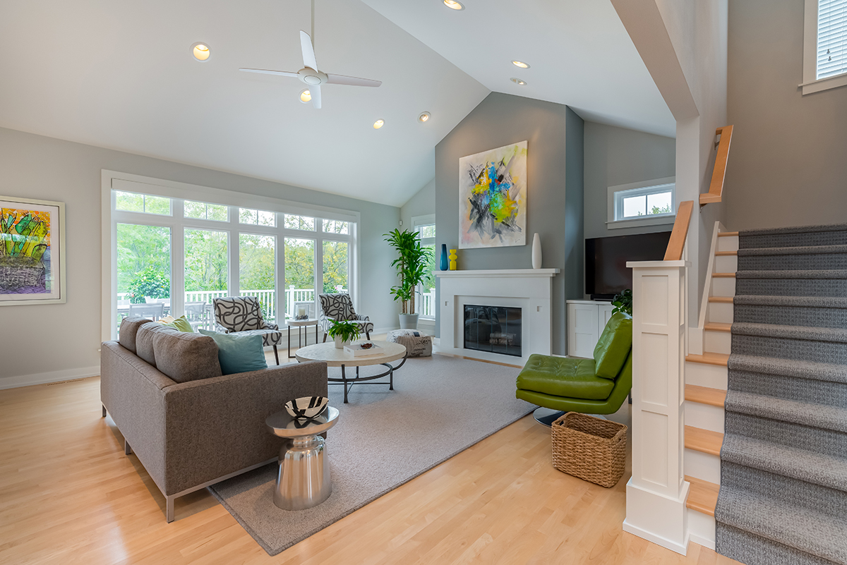updated-living-room-gray-white-natural-floors-open-concept updated-living-room-gray-white-natural-floors-open-concept