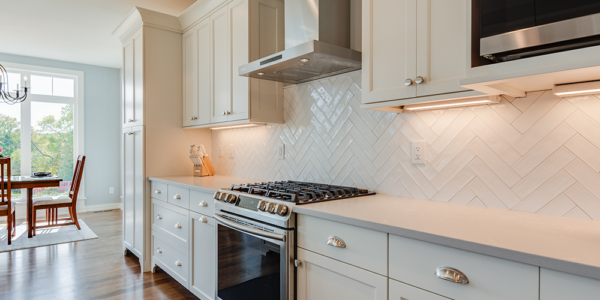 lakeside-white-cabinets-tile-backsplash-kitchen