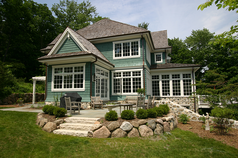 lake-house-new-construction-historic-1900s-charm-exterior-patio