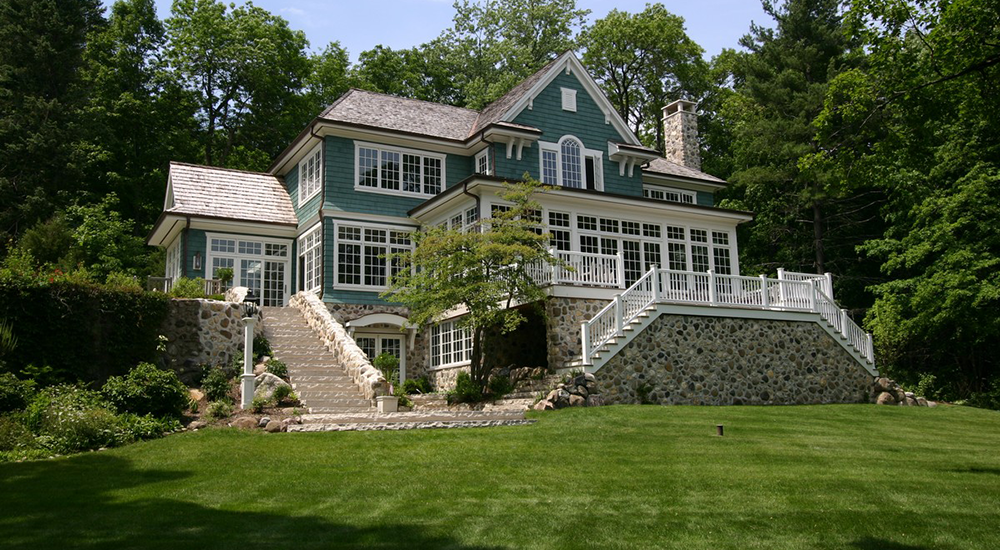 Sophisticated, shingle-style Adirondack-inspired lake cottage in the heart of Lake Country